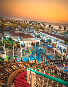 an aerial view of a water park with a roller coaster at Events Allowed: Sunny Villa| Lake| Trails| Beach in La Mesa