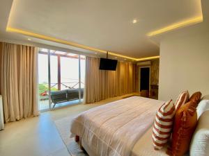 Postel nebo postele na pokoji v ubytování Charme Pousada Boutique & Spa