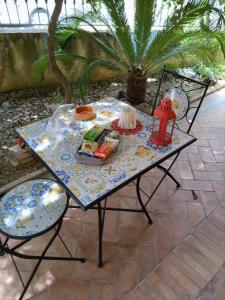 a table with a tray of food on it at B&B VILLA RITA in Silvi Marina