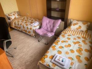 Ένα ή περισσότερα κρεβάτια σε δωμάτιο στο Pirin 7