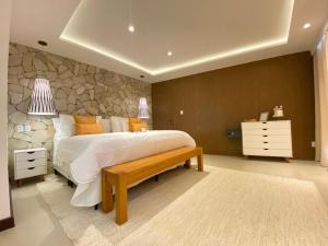Postel nebo postele na pokoji v ubytování Charme Pousada Boutique & Spa