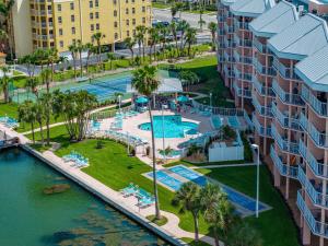 an aerial view of a resort with a swimming pool at Sunrise Resort 210 in St Pete Beach