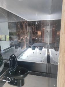 Koupelna v ubytování Hotel maripipark