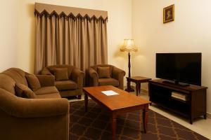 TV a/nebo společenská místnost v ubytování Dream Palace Hotel