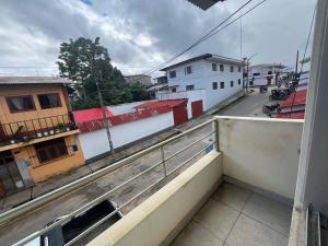 a view of a city street from a balcony at Zzi in Lamas