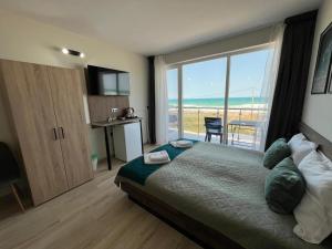 Ένα ή περισσότερα κρεβάτια σε δωμάτιο στο Paradise View Rooms