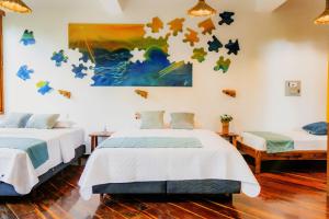 Letto o letti in una camera di Hostería Mandála