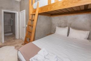 Llit o llits en una habitació de Todo es Posible home