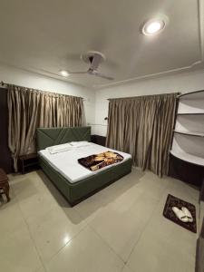 Ένα ή περισσότερα κρεβάτια σε δωμάτιο στο City Scape Inn +13 φωτογραφίες