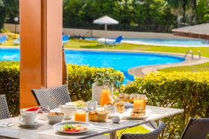 Bazén v ubytování Century Resort nebo v jeho okolí