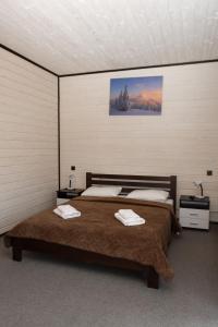 Postel nebo postele na pokoji v ubytování Guest House Sofia