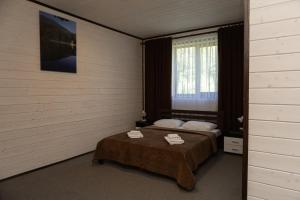 Postel nebo postele na pokoji v ubytování Guest House Sofia