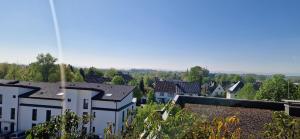 a view of a town with houses and trees at Penthouse mit Whirlpool, Traumblick und großer Dachterrasse in Bad Salzuflen