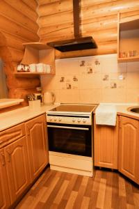 Kuchyň nebo kuchyňský kout v ubytování Guest House Sofia