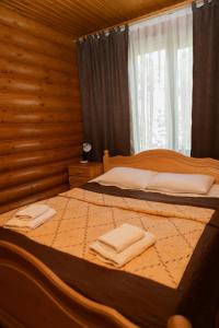 Postel nebo postele na pokoji v ubytování Guest House Sofia