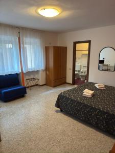 Postel nebo postele na pokoji v ubytování Hotel Benacus