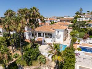 an aerial view of a house with palm trees at Casa Blanca in Manilva