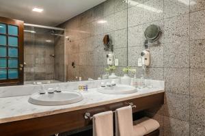 Um banheiro em Bourbon Hotel & Suites Curitiba