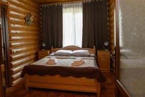 Postel nebo postele na pokoji v ubytování Guest House Sofia