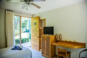 TV a/nebo společenská místnost v ubytování Hotel Sol Sámara