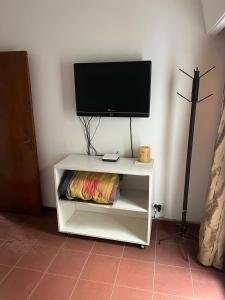 TV a/nebo společenská místnost v ubytování Casa Fleming