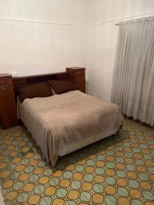 Postel nebo postele na pokoji v ubytování Casa Fleming