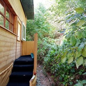 a set of stairs leading to a house at A-Sissy-Hof Tierschutzhof 