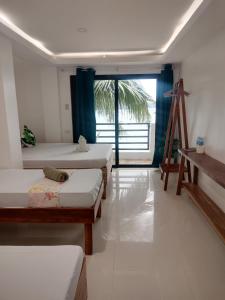 Fotografie z fotogalerie ubytování Joyful Guest House v destinaci El Nido