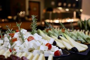 a bunch of food on plates on a table at Hotel Puerto Palace in Puerto de la Cruz