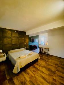 Ένα ή περισσότερα κρεβάτια σε δωμάτιο στο El Refugio - Hotel Mariscala