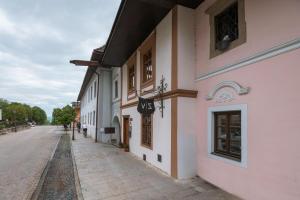 an empty street next to a building at Vila Zipser in Poprad
