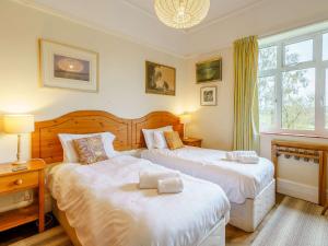 Ένα ή περισσότερα κρεβάτια σε δωμάτιο στο 4 Bed in Near and Far Sawrey LLH42