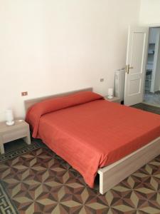 Postel nebo postele na pokoji v ubytování B&B Zia Iaia