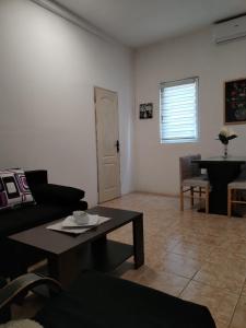 Posezení v ubytování Išić apartmani + 5 fotografií
