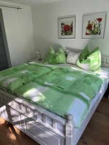 Posteľ alebo postele v izbe v ubytovaní Ferienwohnung Am Jodlerweg