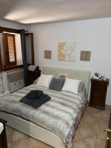 Ένα ή περισσότερα κρεβάτια σε δωμάτιο στο Villa Sedici