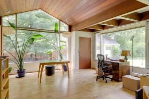 an office with a desk and a large window at Spacious and Updated Farmhouse in Yellow Springs in Fairborn