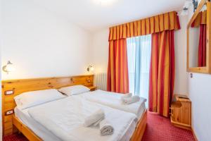 Postel nebo postele na pokoji v ubytování Hotel Polsa