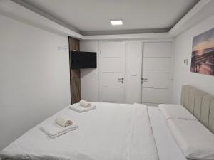 Ένα ή περισσότερα κρεβάτια σε δωμάτιο στο Edy