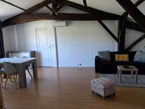 Posezení v ubytování Appartement à 15 min des plages Montalivet