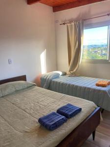 Postel nebo postele na pokoji v ubytování Departamento ideal Pileta, Parrilla y Pet friendly
