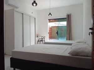 Ένα ή περισσότερα κρεβάτια σε δωμάτιο στο Green house +36 φωτογραφίες