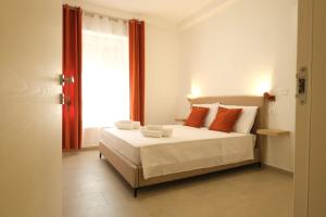 Postel nebo postele na pokoji v ubytování Marephis Rooms - Alghero