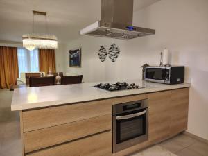 Η κουζίνα ή μικρή κουζίνα στο Playa Nueva Romana South Beach D23