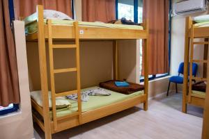 Llit o llits en una habitació de D1 Hostel