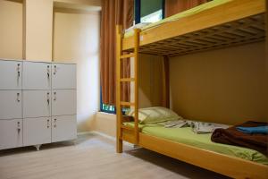 Llit o llits en una habitació de D1 Hostel