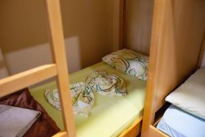Llit o llits en una habitació de D1 Hostel