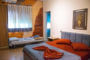 Llit o llits en una habitació de D1 Hostel