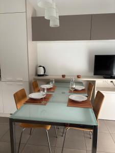 TV a/nebo společenská místnost v ubytování Residenza Torricelli + 8 fotografií