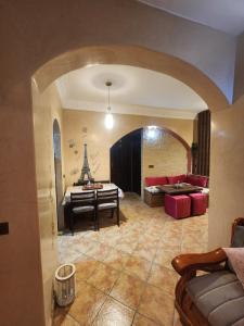 a living room with a couch and a table at Kalaat El Mansouria in Mansouria +19 photos
